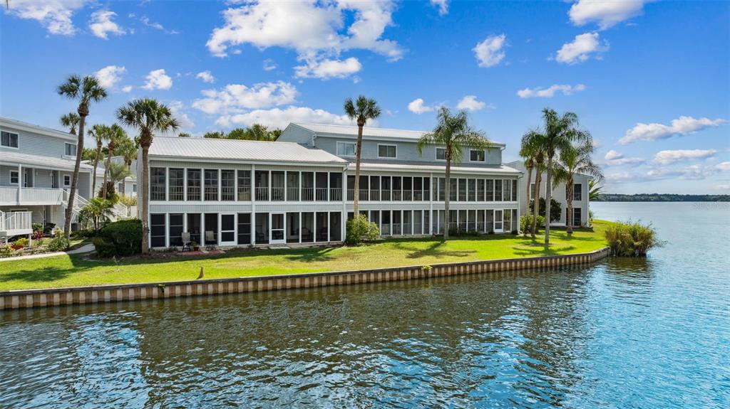 125 River Bend Road, Unit D Welaka, FL 32193 - Photo 31 of 53 a view of a swimming pool with an outdoor seating