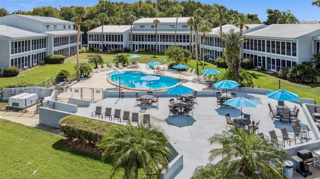 125 River Bend Road, Unit D Welaka, FL 32193 - Photo 41 of 53 an aerial view of a house with swimming pool patio and outdoor seating