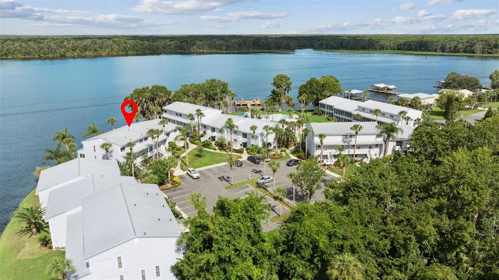 125 River Bend Road, Unit D Welaka, FL 32193 - Photo 47 of 53 an aerial view of a house with a lake view