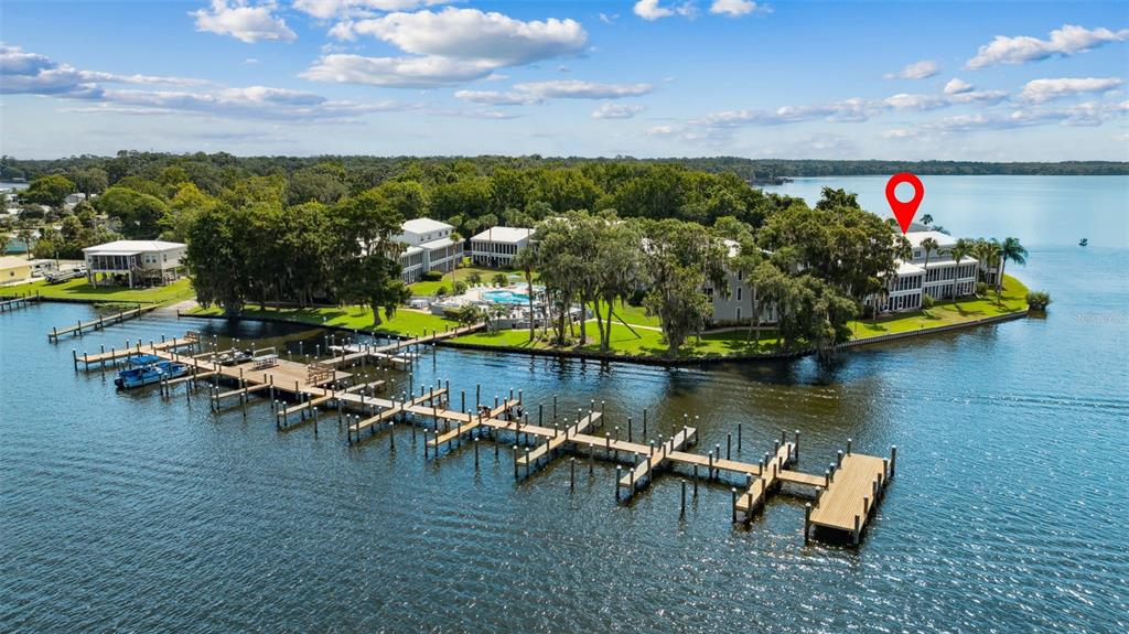 125 River Bend Road, Unit D Welaka, FL 32193 - Photo 48 of 53 a view of a lake with a nearby beach