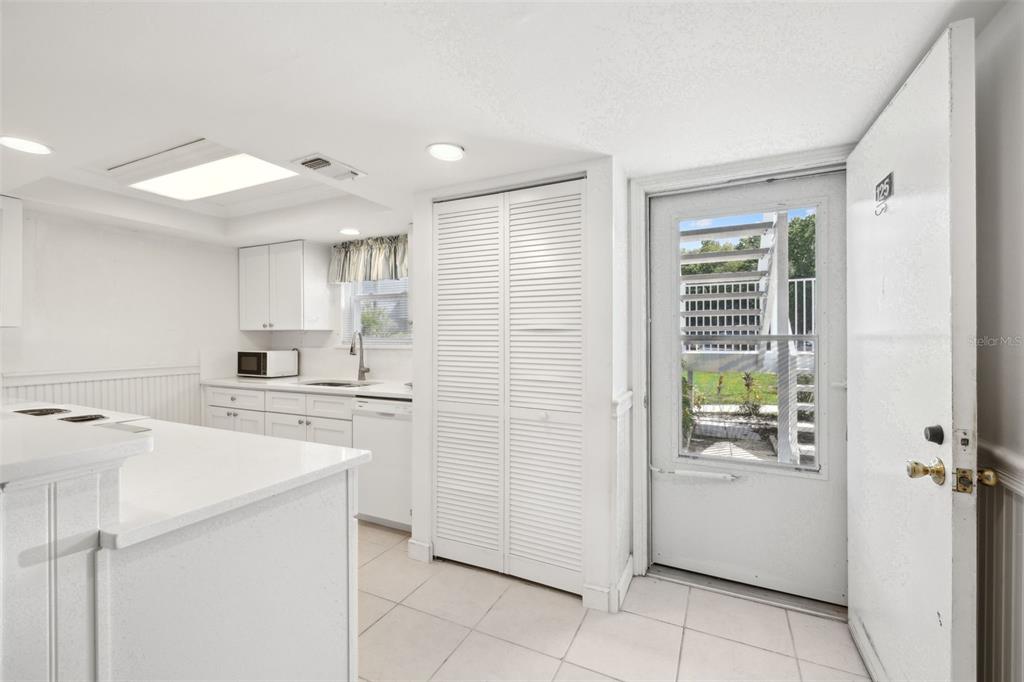125 River Bend Road, Unit D Welaka, FL 32193 - Photo 7 of 53 a kitchen with a stove a refrigerator and a sink