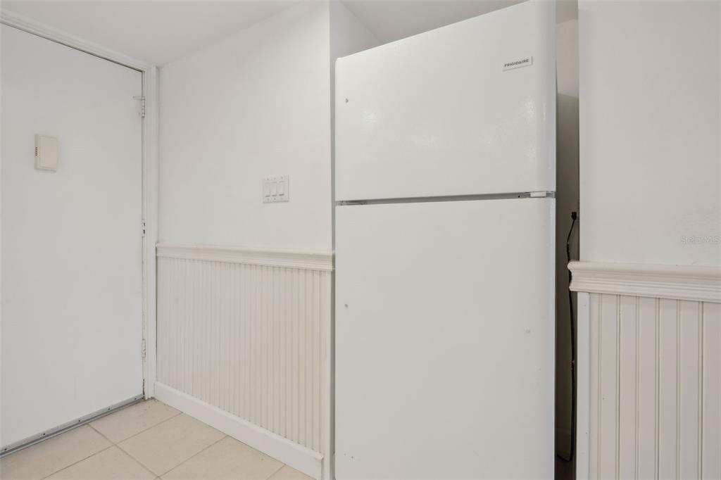 125 River Bend Road, Unit D Welaka, FL 32193 - Photo 9 of 53 a white refrigerator freezer and a dishwasher