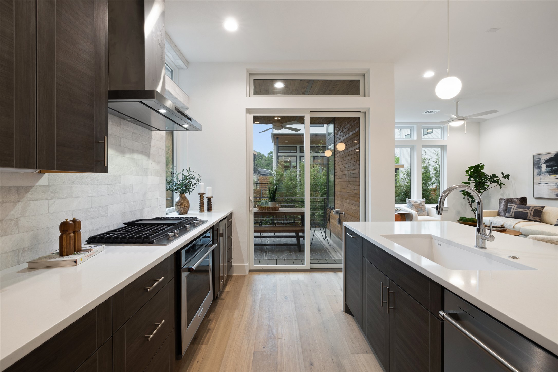 900 South 2nd Street, Unit 20 Austin, TX 78704 - Photo 13 of 40 a kitchen with stainless steel appliances granite countertop a sink stove and cabinets