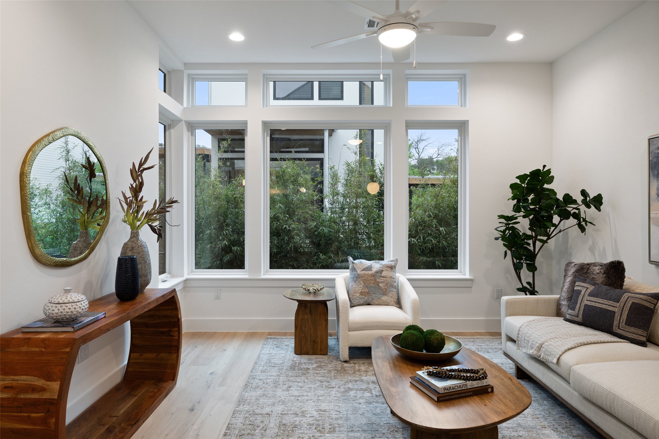 900 South 2nd Street, Unit 20 Austin, TX 78704 - Photo 24 of 40 a living room with furniture and a floor to ceiling window