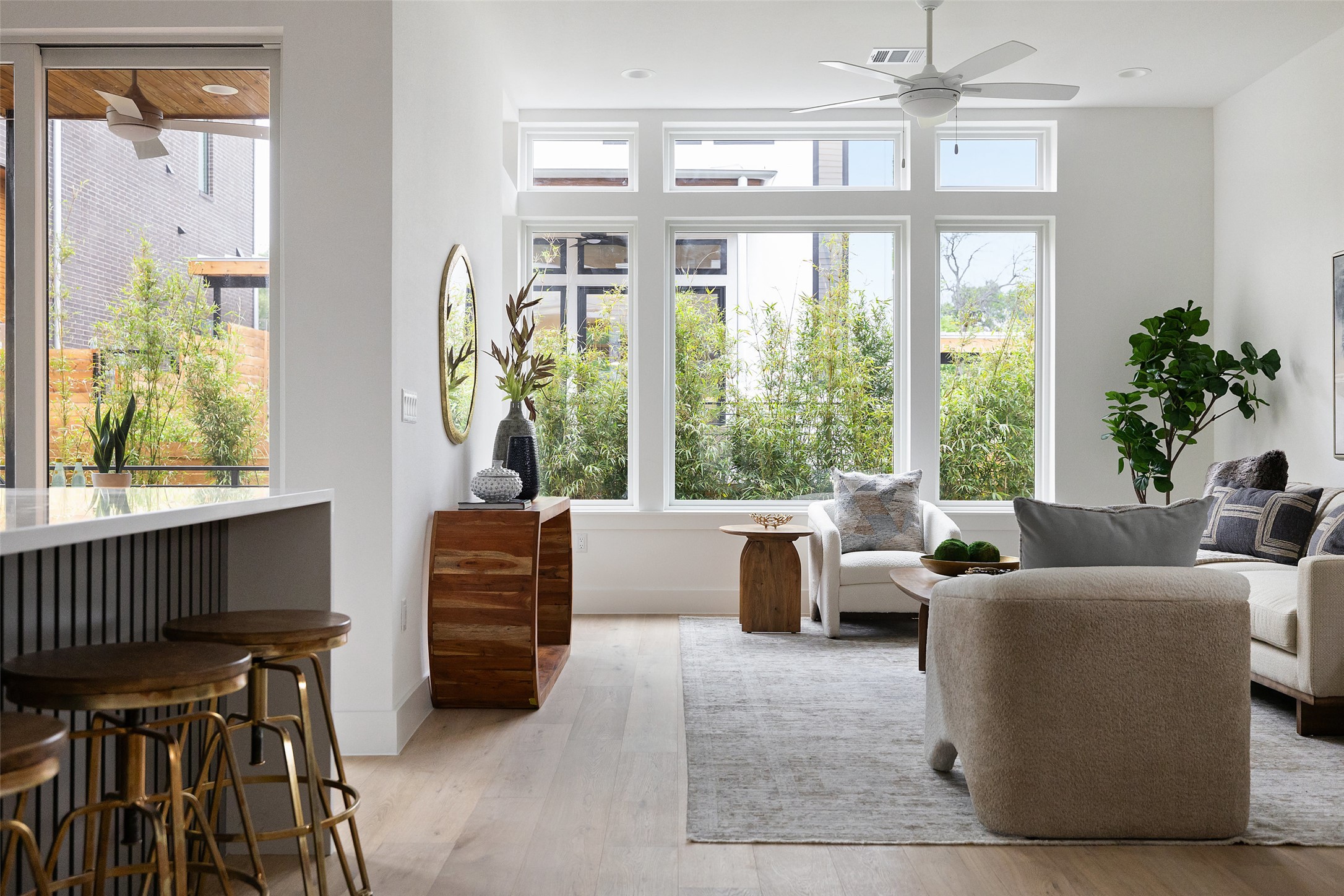 900 South 2nd Street, Unit 20 Austin, TX 78704 - Photo 3 of 40 a living room with furniture and a large window