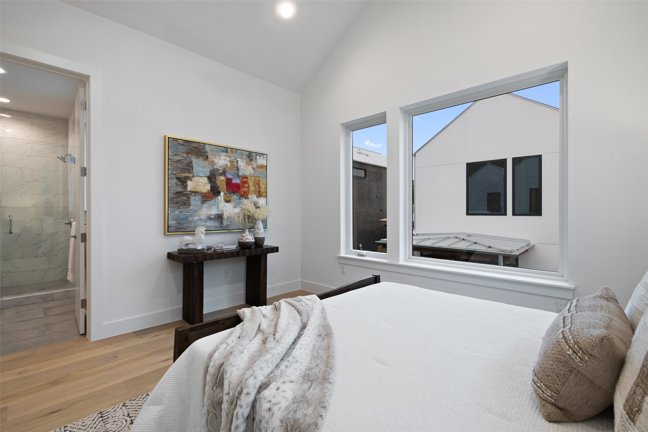 900 South 2nd Street, Unit 20 Austin, TX 78704 - Photo 38 of 40 a bedroom with a bed and a flat screen tv