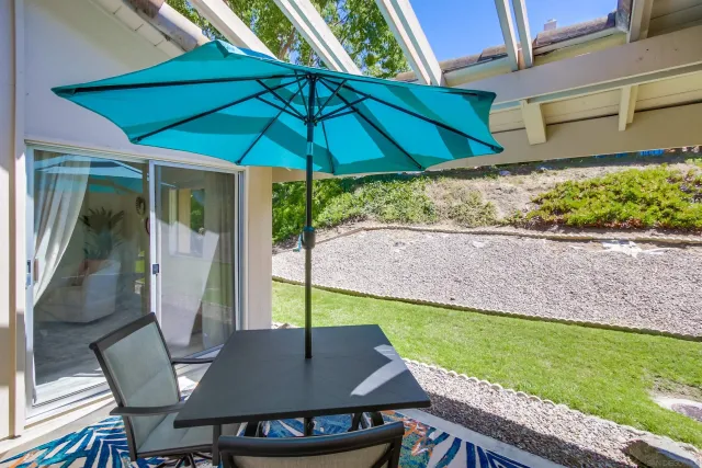 a view of yard with patio