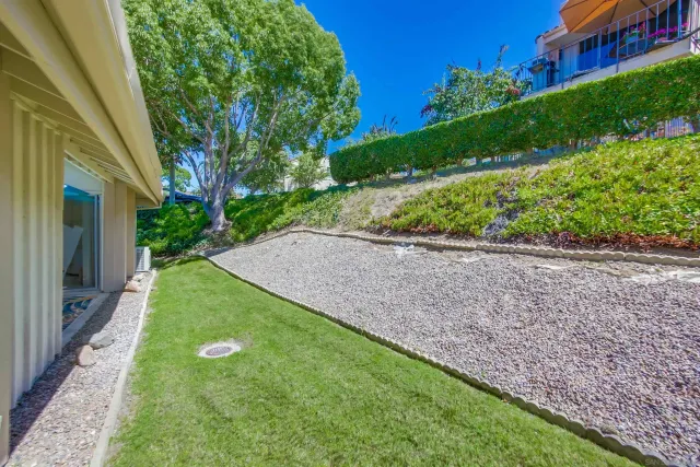 a view of a backyard with a garden