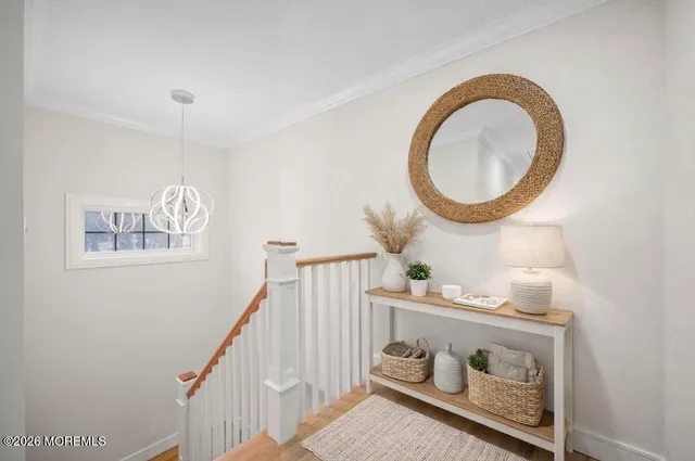 a close view of light fixtures and wooden floor