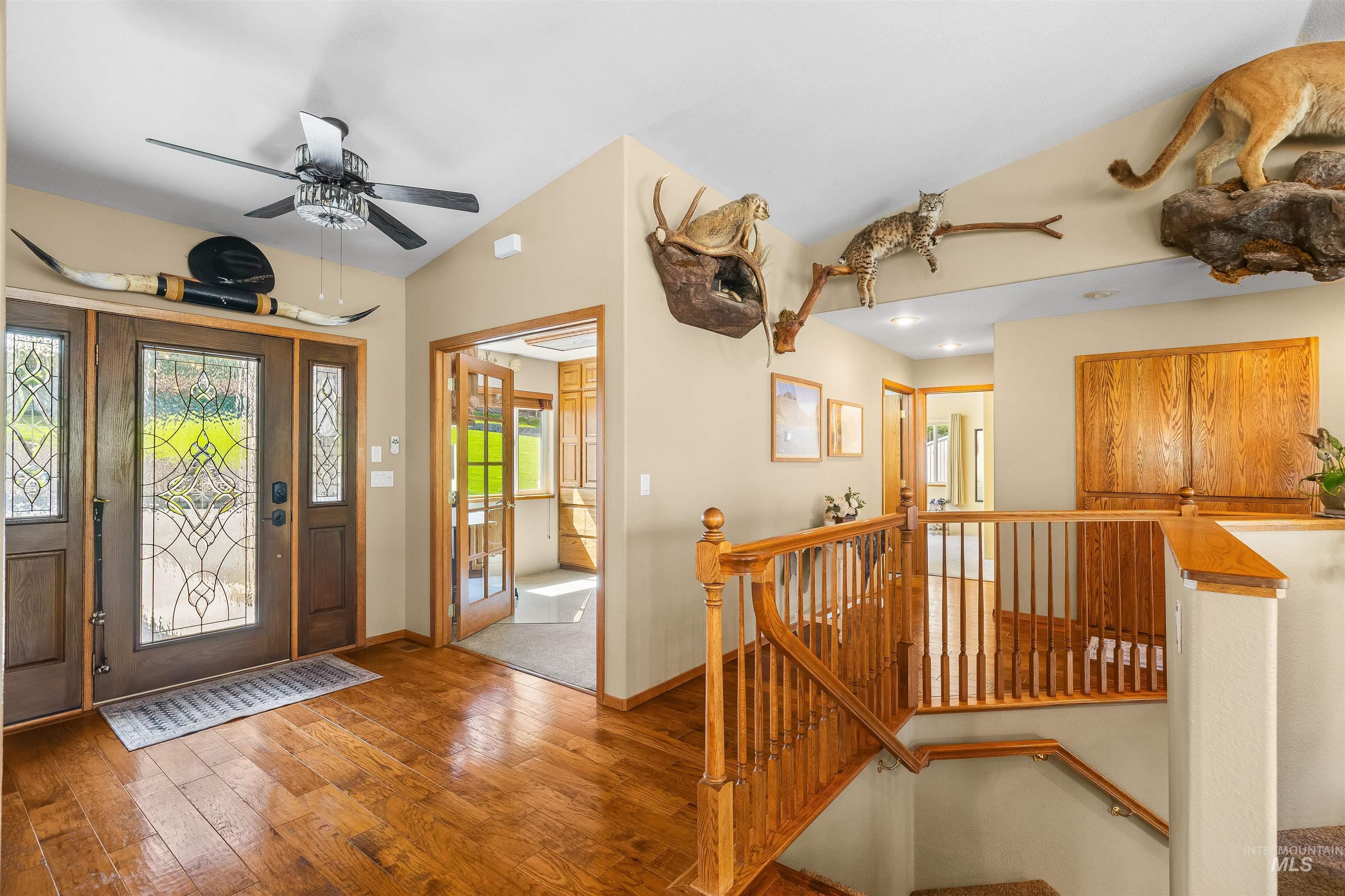 11056 Snake River Road Asotin, WA 99402 - Photo 11 of 50 Entryway with ceiling fan, hardwood / wood-style flooring, and vaulted ceiling