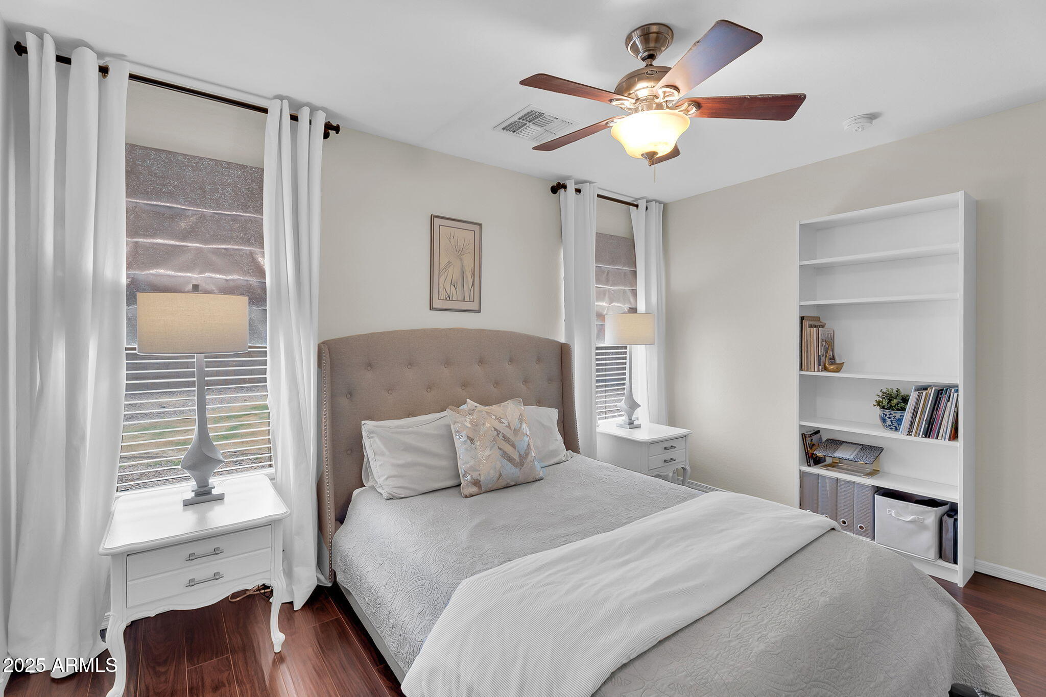4013 East Superior Road San Tan Valley, AZ 85143 - Photo 11 of 31 a bedroom with a bed and a chandelier