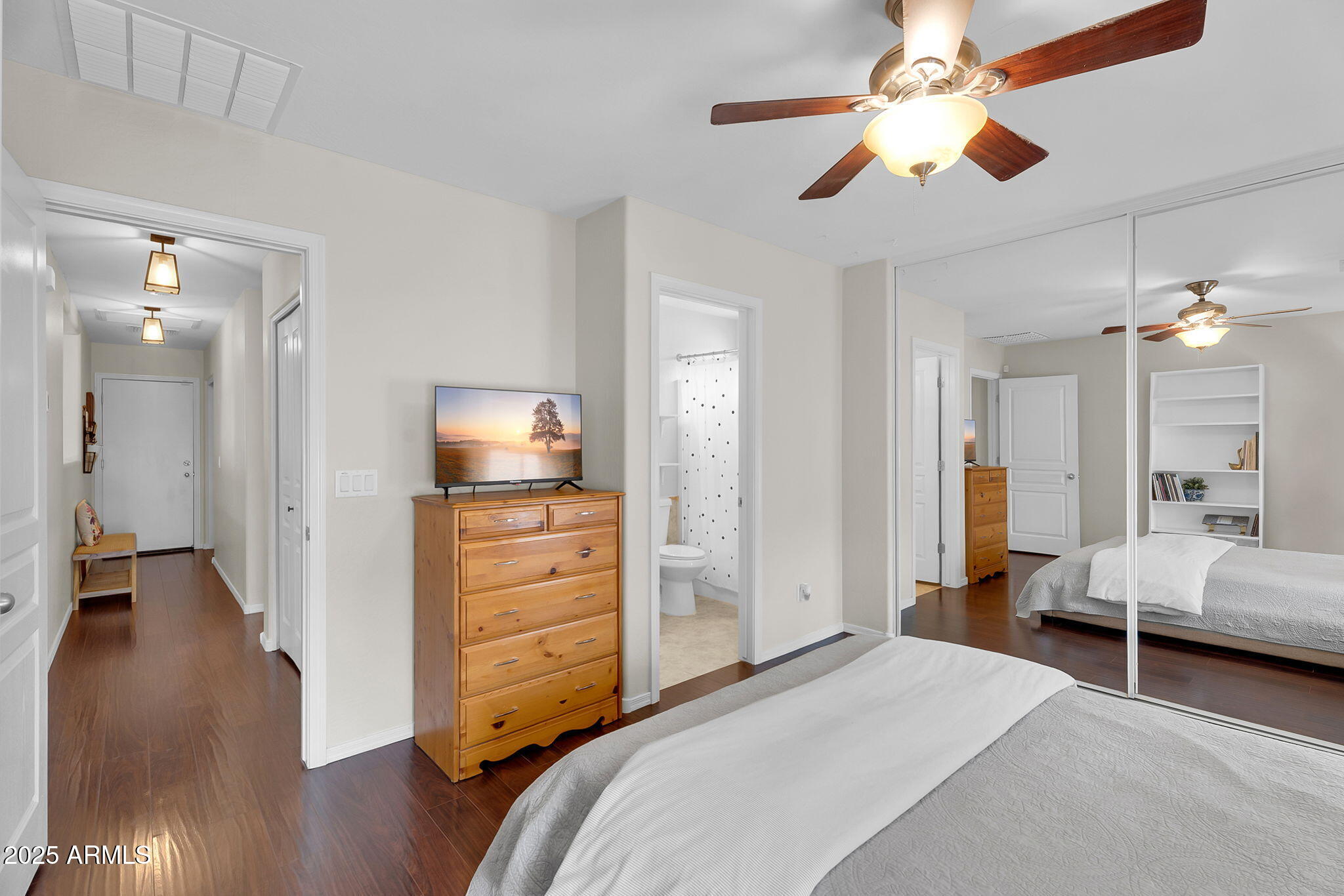 4013 East Superior Road San Tan Valley, AZ 85143 - Photo 13 of 31 a bedroom with a bed and a chandelier