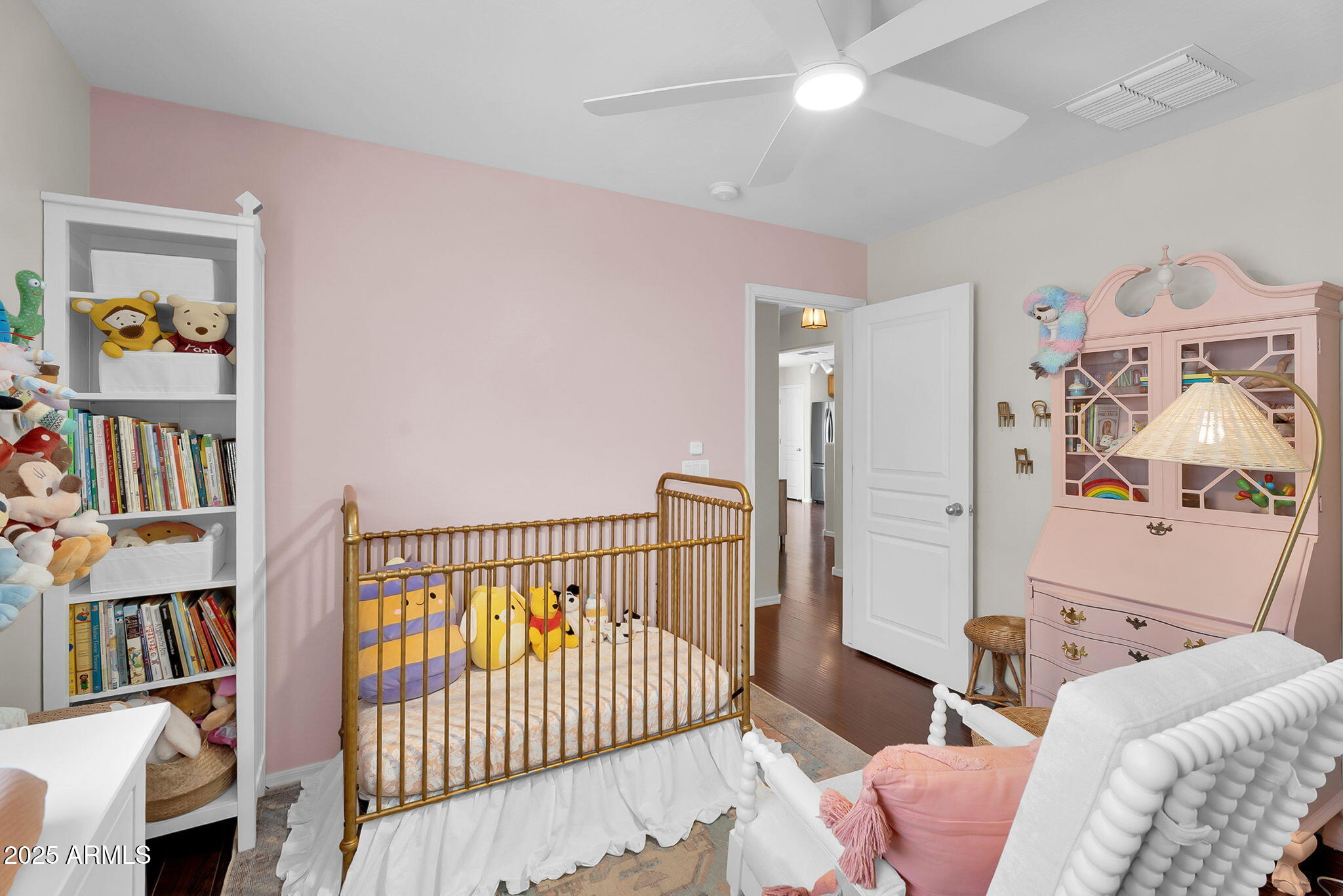 4013 East Superior Road San Tan Valley, AZ 85143 - Photo 15 of 31 a bedroom with furniture and a book shelf