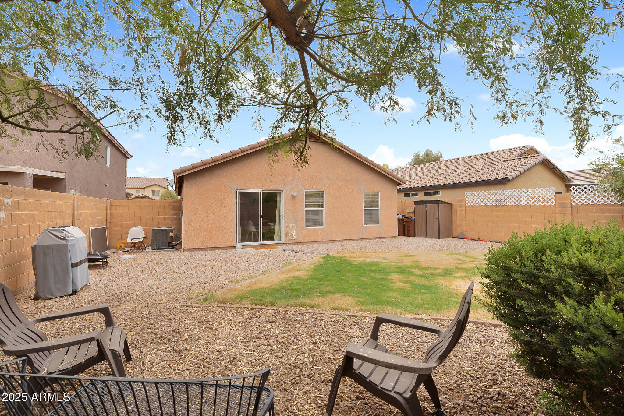 4013 East Superior Road San Tan Valley, AZ 85143 - Photo 19 of 31 a view of a house with backyard and sitting area