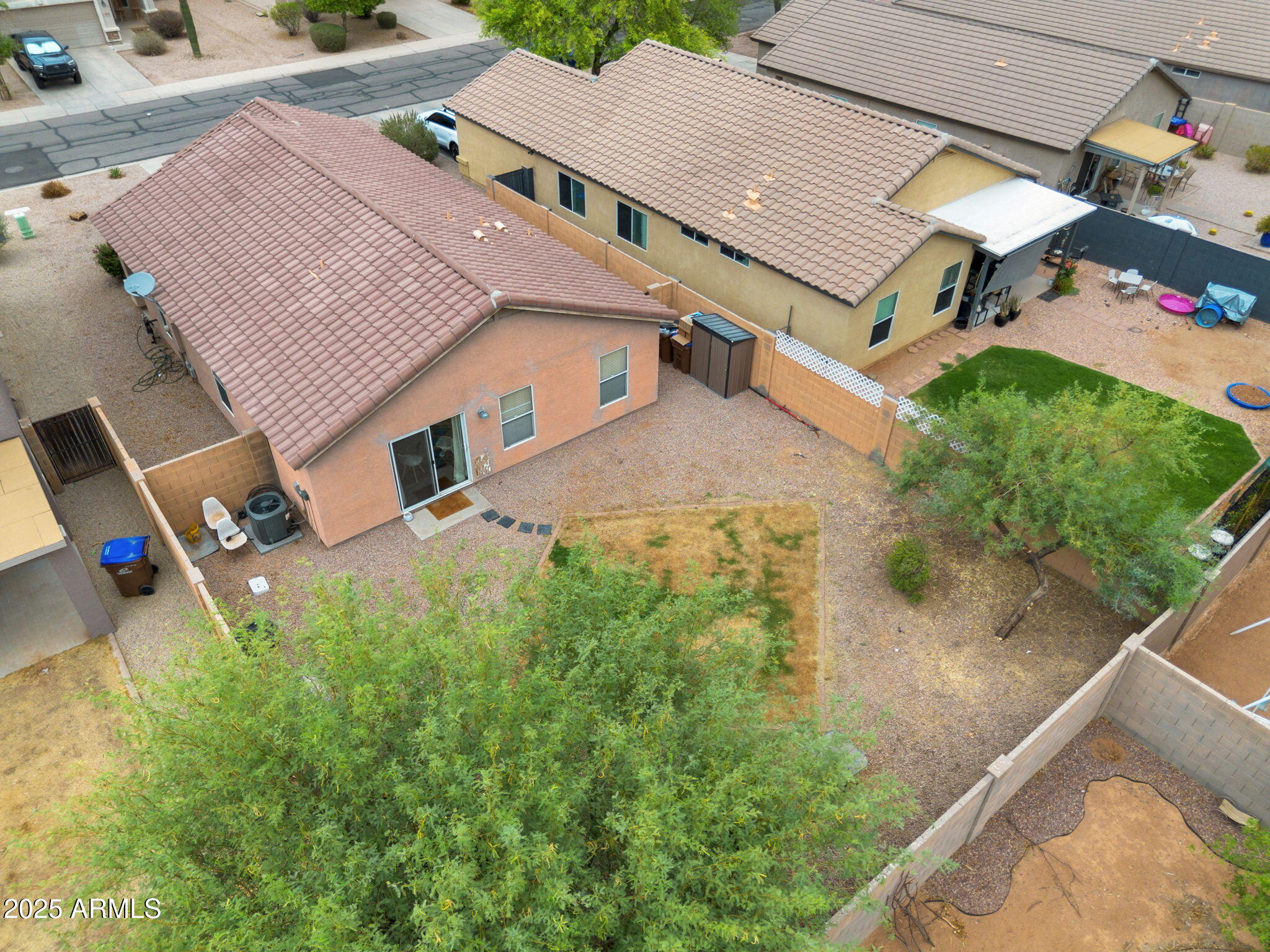 4013 East Superior Road San Tan Valley, AZ 85143 - Photo 27 of 31 an aerial view of a house with a yard and a garage