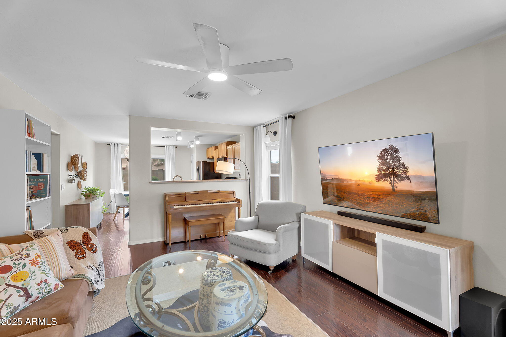 4013 East Superior Road San Tan Valley, AZ 85143 - Photo 3 of 31 a living room with furniture and a flat screen tv