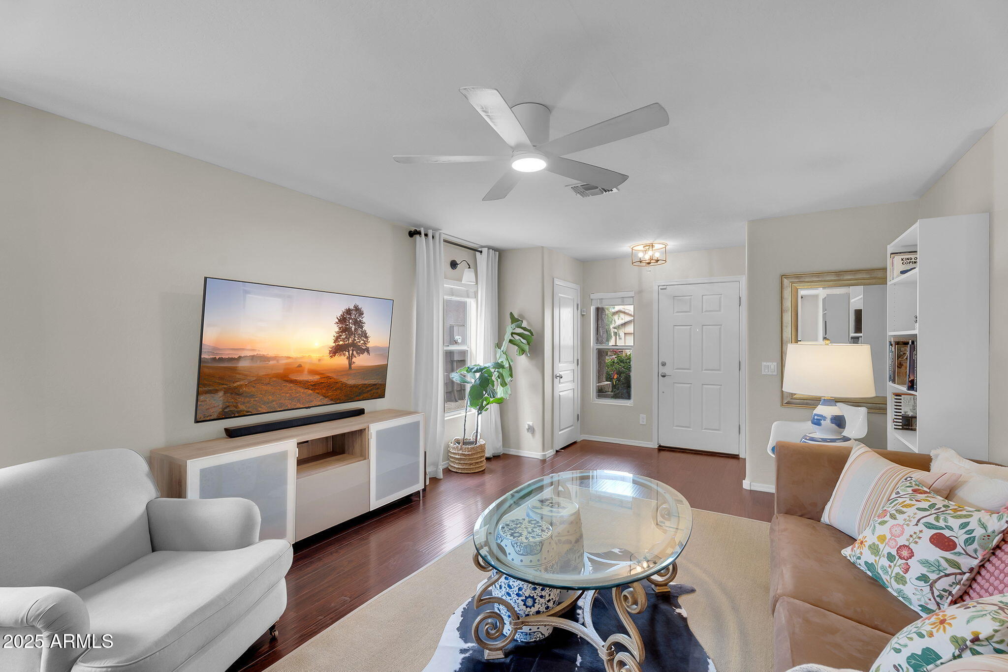 4013 East Superior Road San Tan Valley, AZ 85143 - Photo 4 of 31 a living room with furniture and a flat screen tv