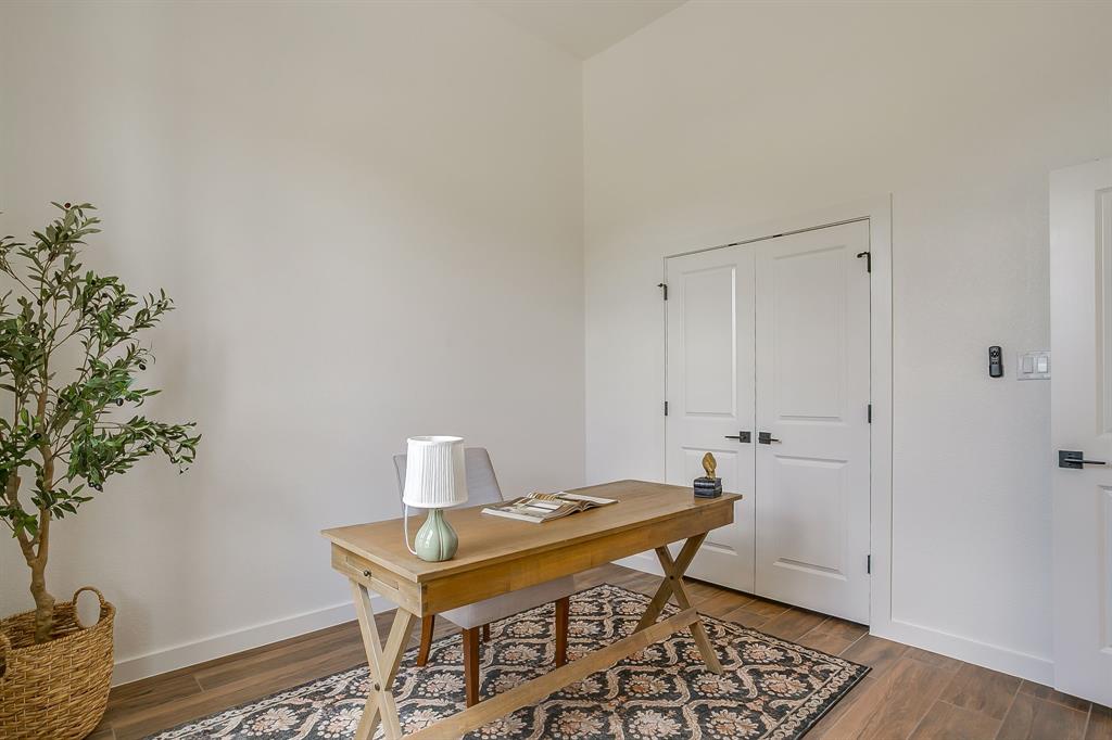 9012 Valley Oak Court Springtown, TX 76082 - Photo 7 of 40 a room with furniture and wooden floor