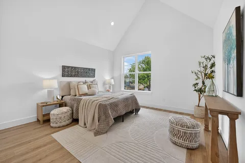 a view of a house with a door and wooden walls