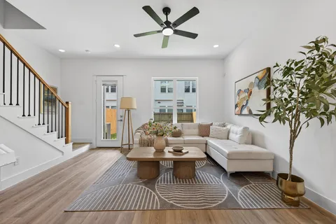 a kitchen with stainless steel appliances a sink stove and microwave