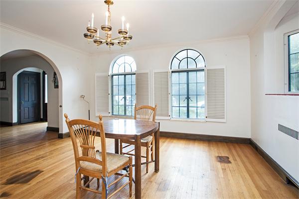 25 Dolphin Road Newton, MA 02459 - Photo 8 of 30 a view of a dining room with furniture a chandelier and wooden floor