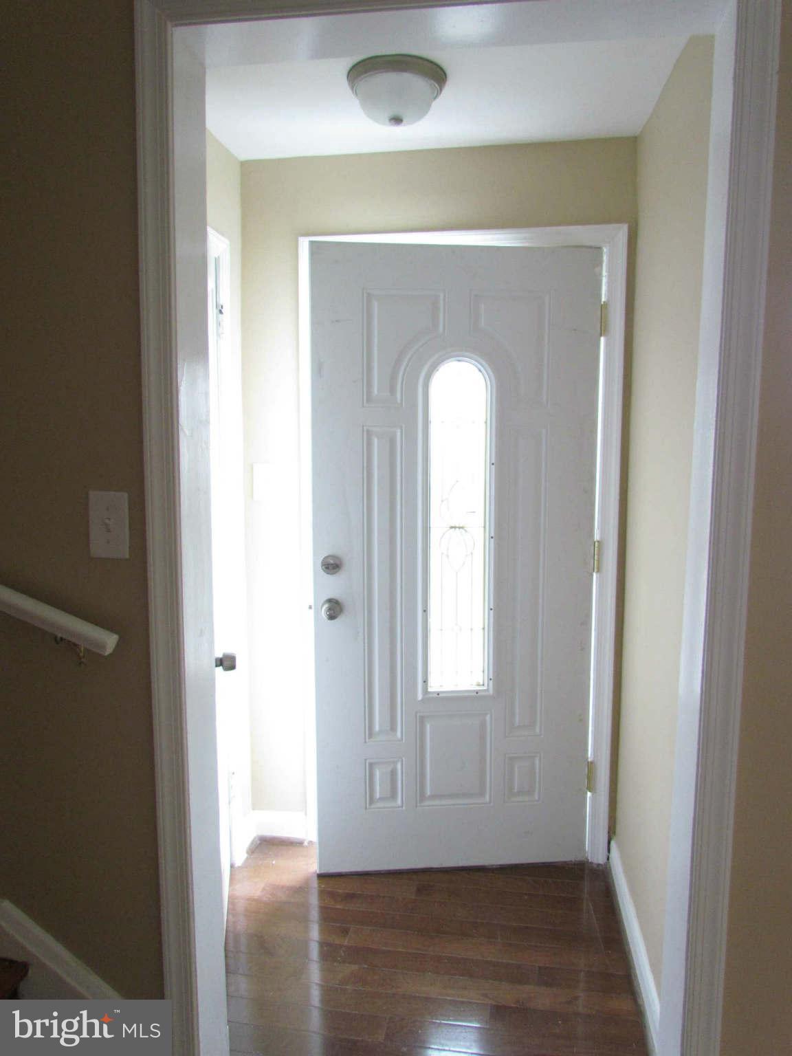1604 Northbourne Road Baltimore, MD 21239 - Photo 12 of 12 a view of empty room with wooden floor