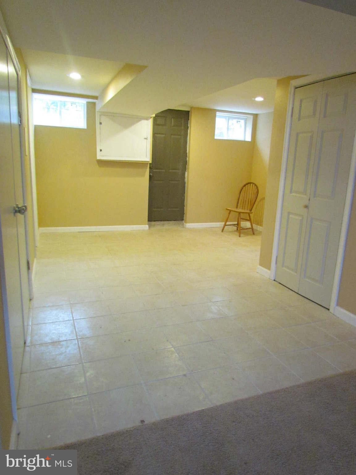 1604 Northbourne Road Baltimore, MD 21239 - Photo 8 of 12 a view of a livingroom with wooden floor