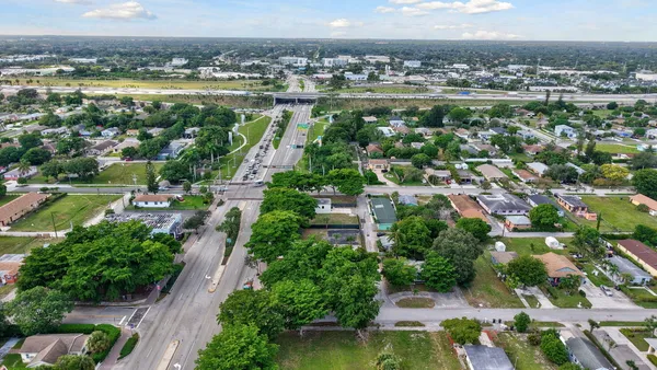 a view of a city with lots of trees