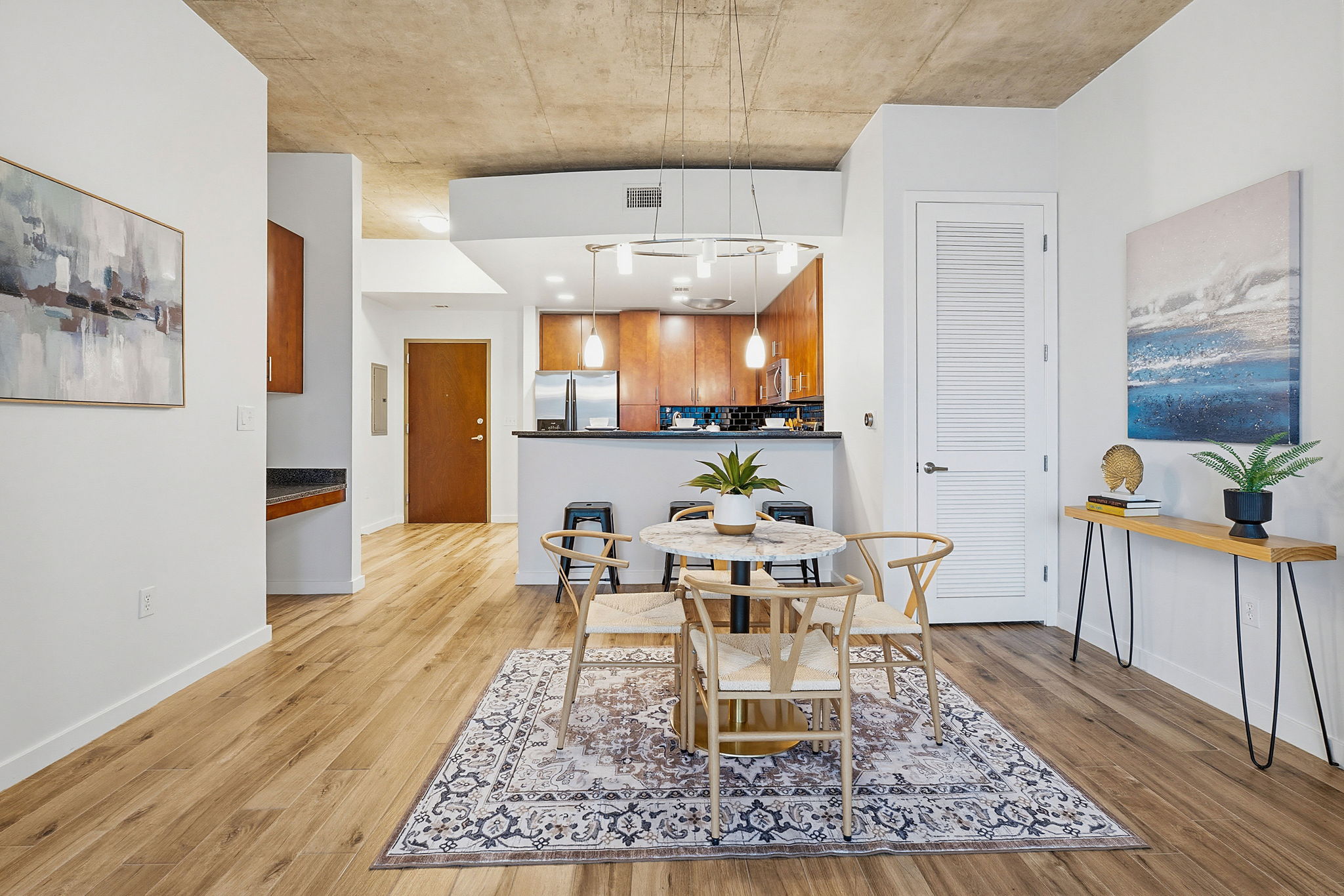 360 Nueces Street, Unit 1505 Austin, TX 78701 - Photo 5 of 28 a view of a dining room with furniture