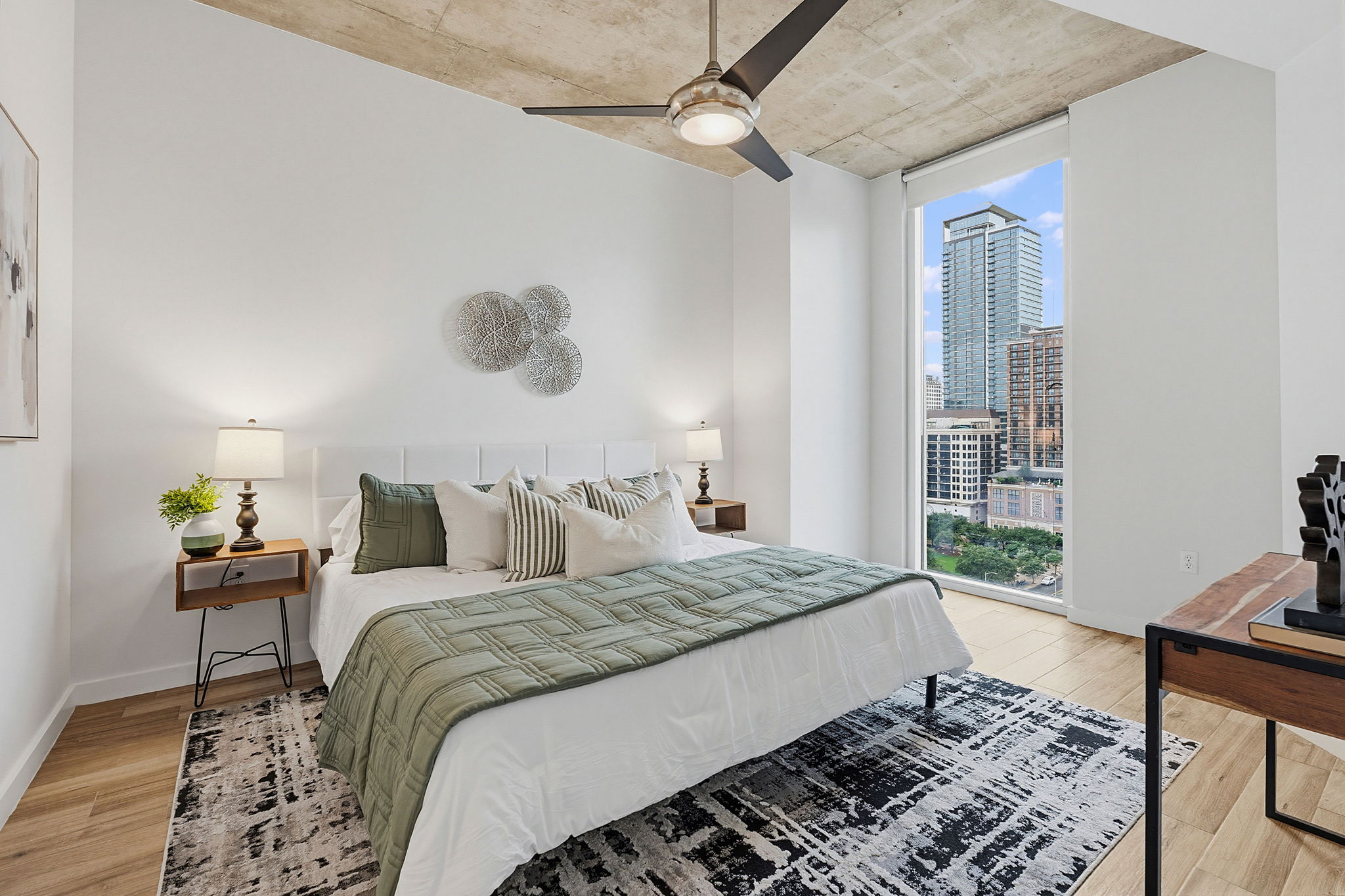 360 Nueces Street, Unit 1505 Austin, TX 78701 - Photo 8 of 28 a bedroom with a bed and window