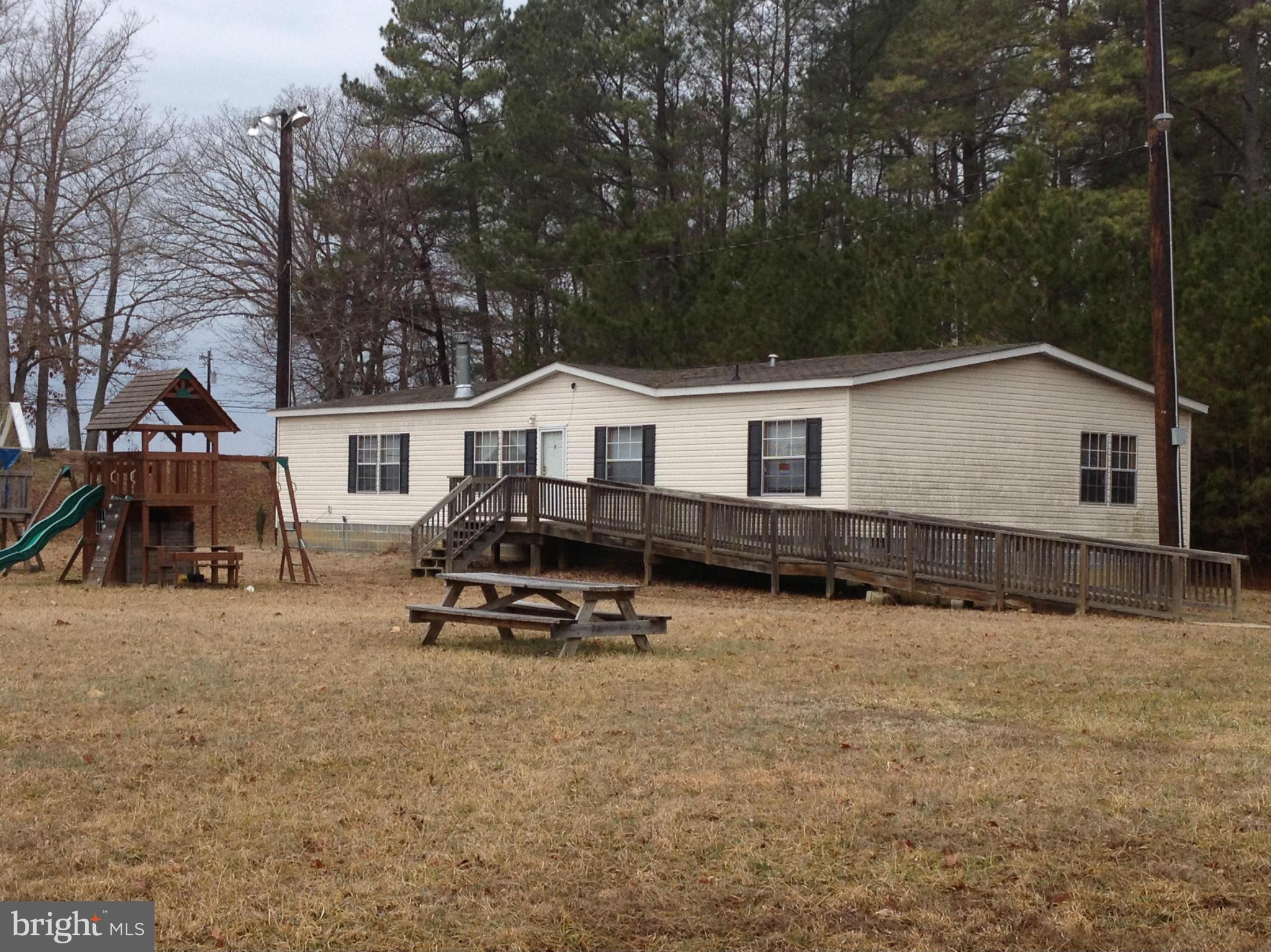 45200 Happyland Road Valley Lee, MD 20692 - Photo 1 of 24 a view of a house with backyard