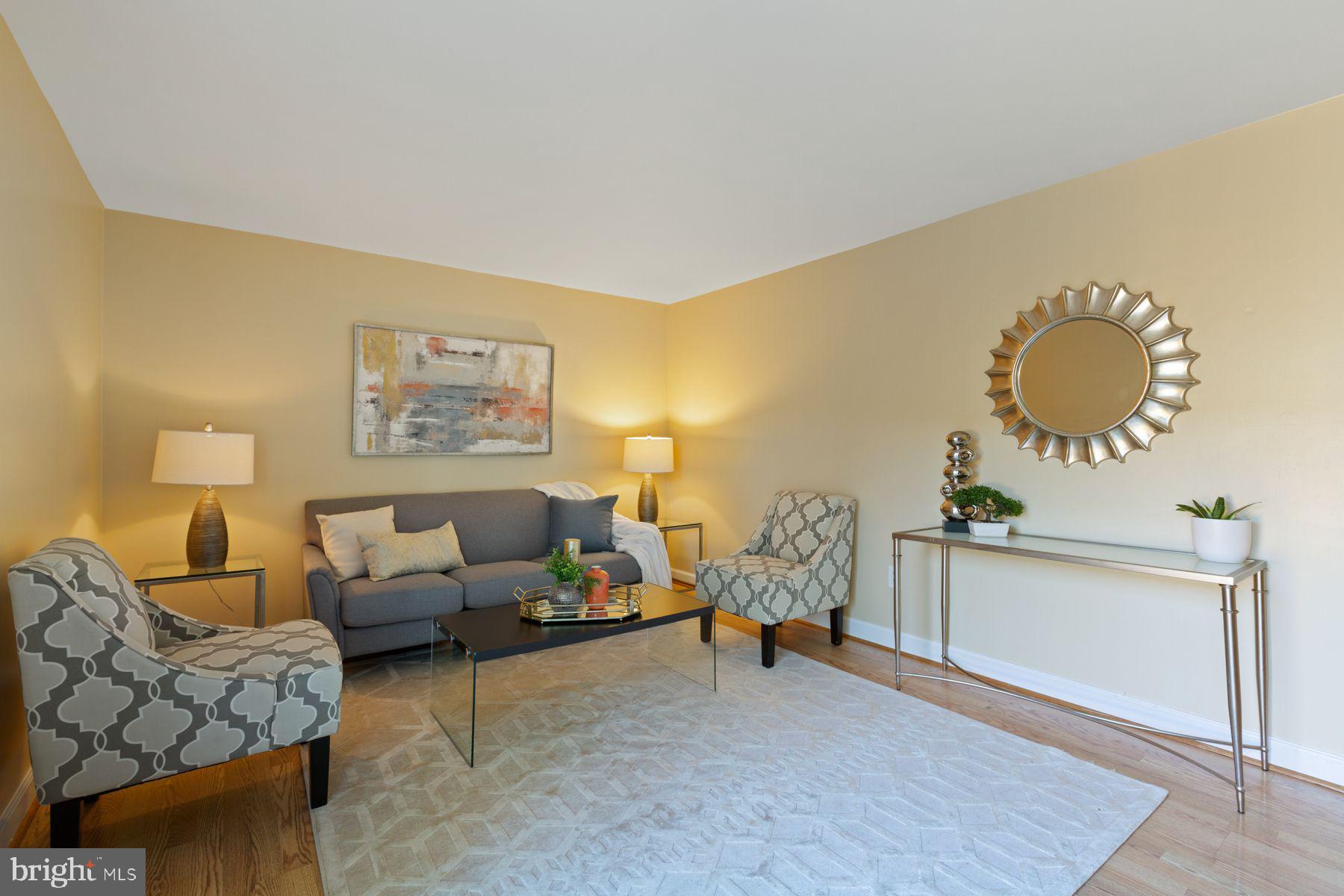 17660 Kohlhoss Road Poolesville, MD 20837 - Photo 6 of 22 a living room with furniture and a wooden floor