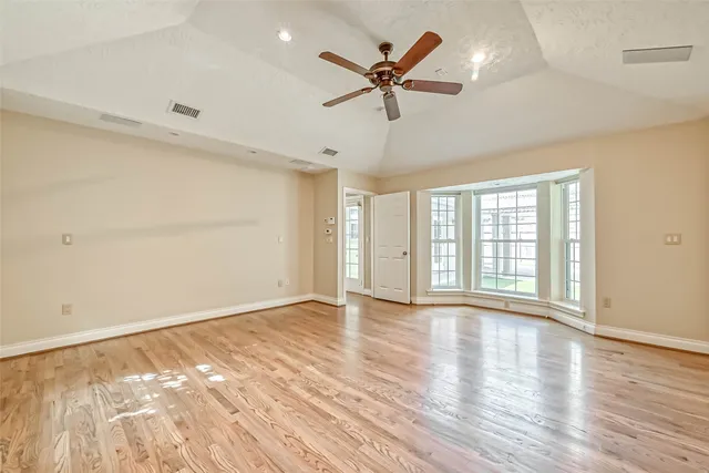 a bathroom with a granite countertop sink mirror and double
