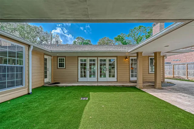 a backyard of a house with seating space