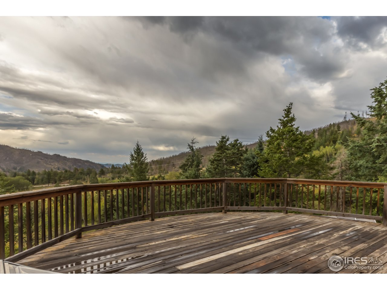 15860 Rist Canyon Road Bellvue, CO 80512 - Photo 8 of 37 Huge deck with amazing views