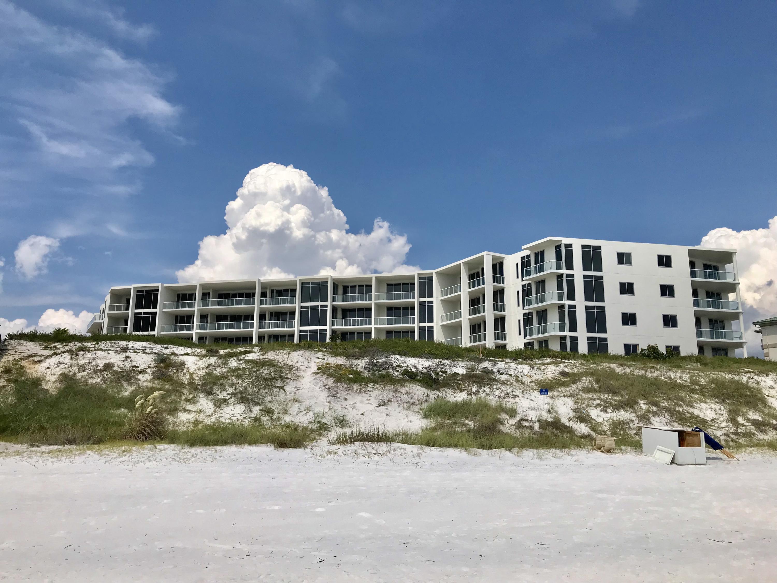 3820 East County Highway 30A, Unit 402 Santa Rosa Beach, FL 32459 - Photo 2 of 2 a view of a house with a yard and sitting area