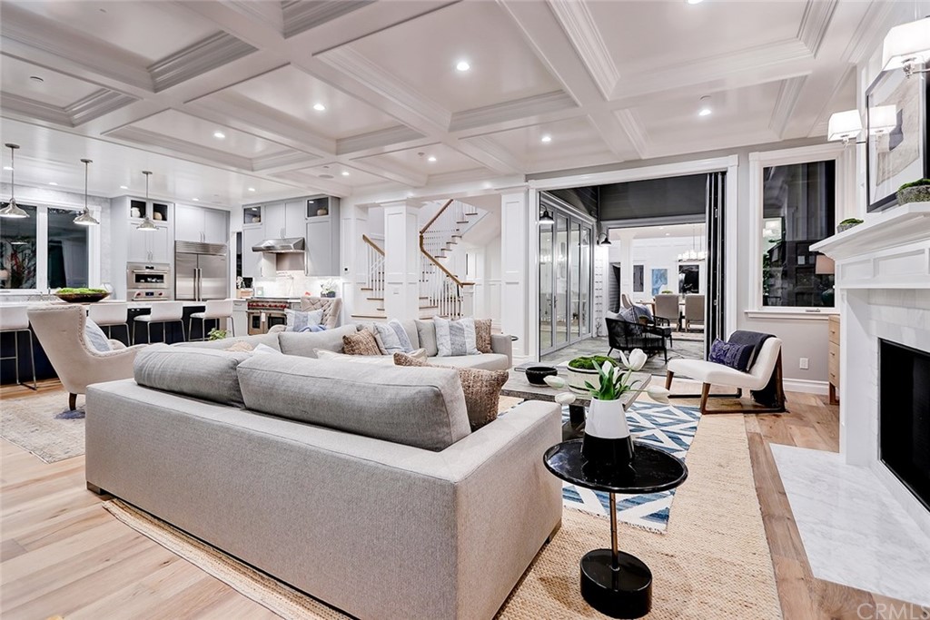 1751 8th Street Manhattan Beach, CA 90266 - Photo 11 of 43 a living room with furniture and a fireplace