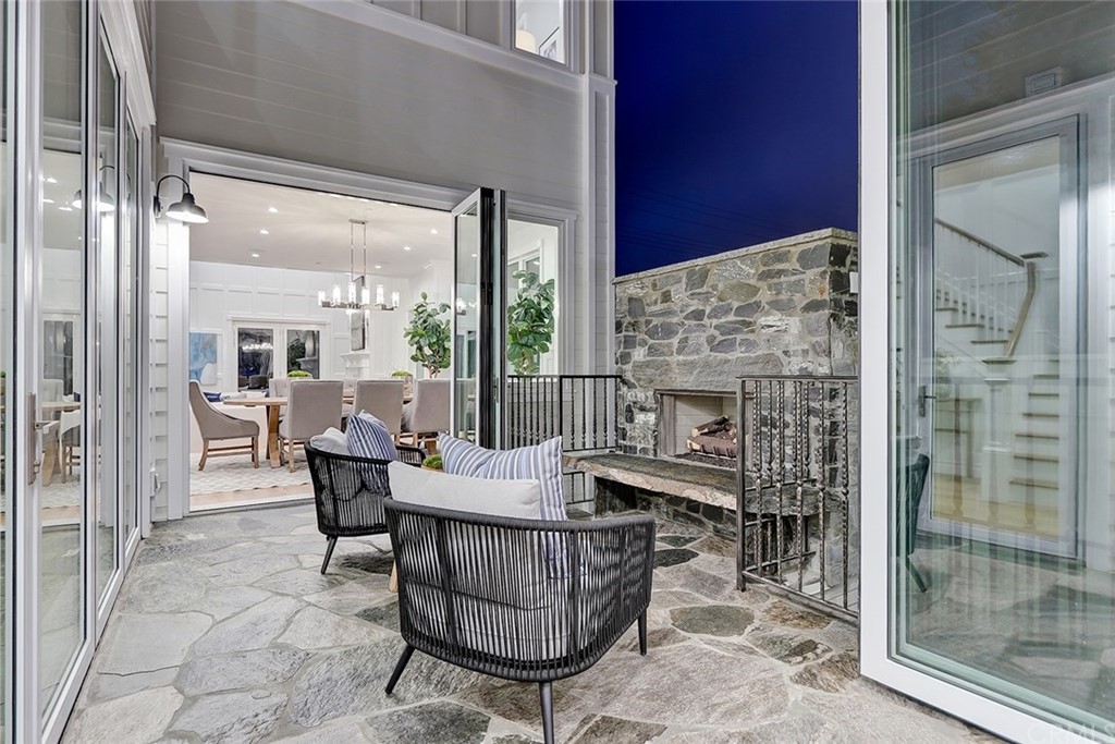 1751 8th Street Manhattan Beach, CA 90266 - Photo 12 of 43 a dining room with furniture and large windows