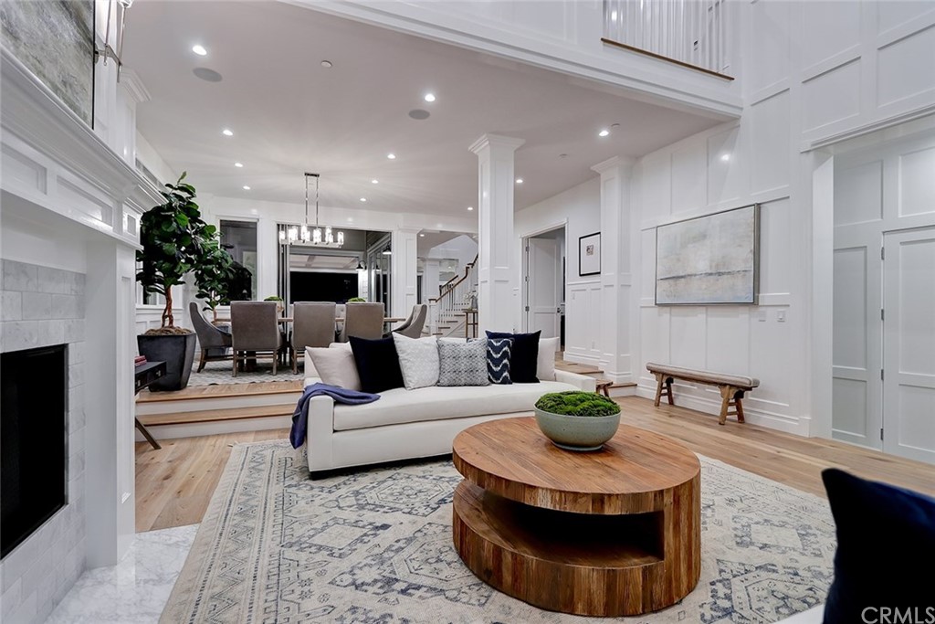 1751 8th Street Manhattan Beach, CA 90266 - Photo 19 of 43 a living room with furniture a fireplace and a couch