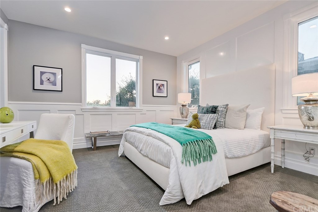 1751 8th Street Manhattan Beach, CA 90266 - Photo 41 of 43 a bedroom with a bed and window