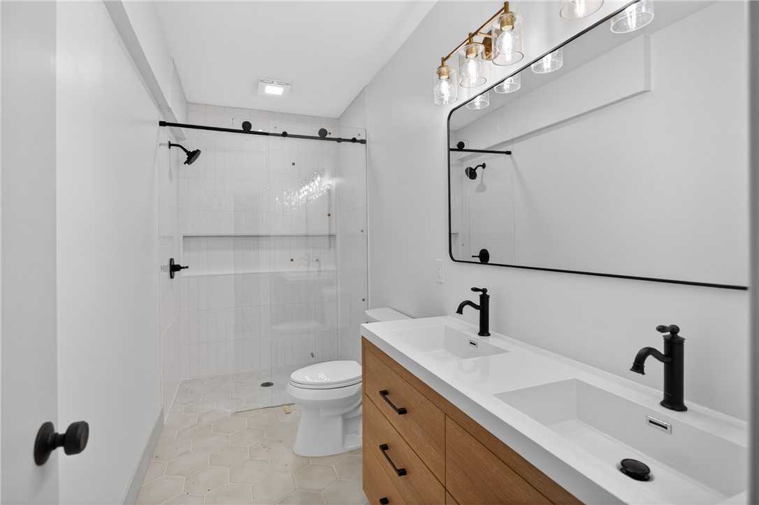 304 Lakeside Drive Seneca, SC 29672 - Photo 35 of 50 Downstairs Bathroom with double vanities.