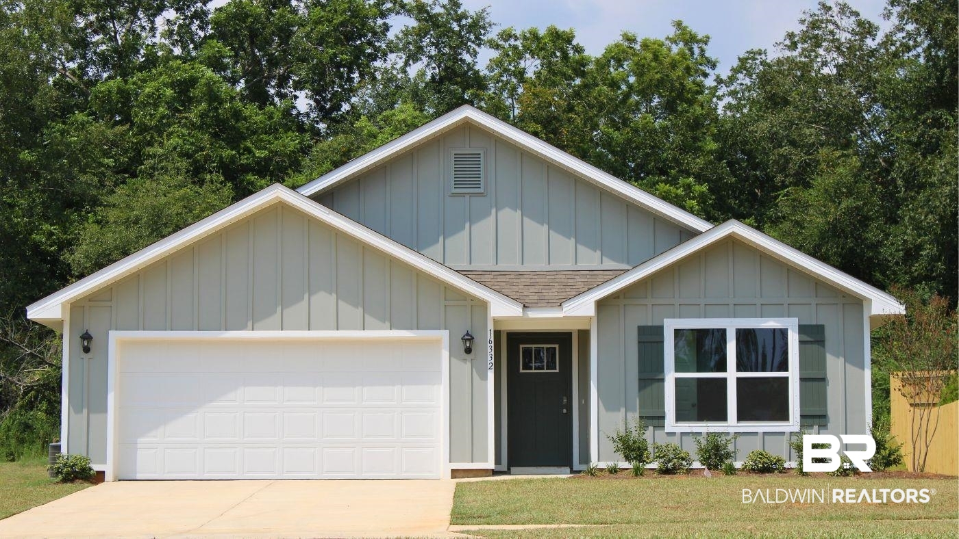 16332 Laurelbrooke Loop Fairhope, AL 36532 - Photo 1 of 31 View of front of property with a garage and a front lawn