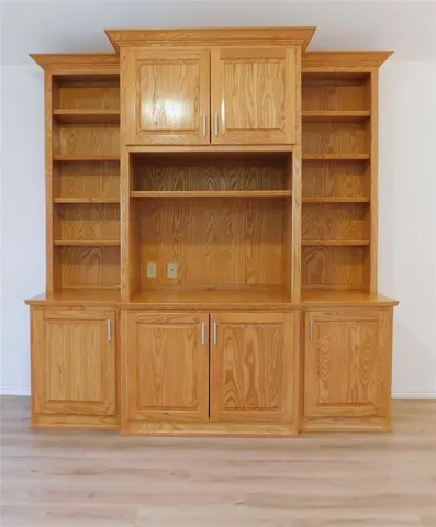 a view of wooden door and entryway