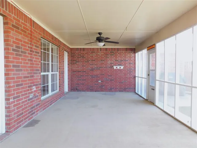 en empty room with windows