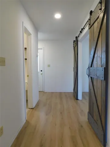 a view of hallway with stairs