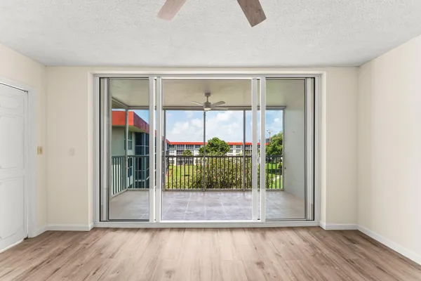 a view of a room that has a large window