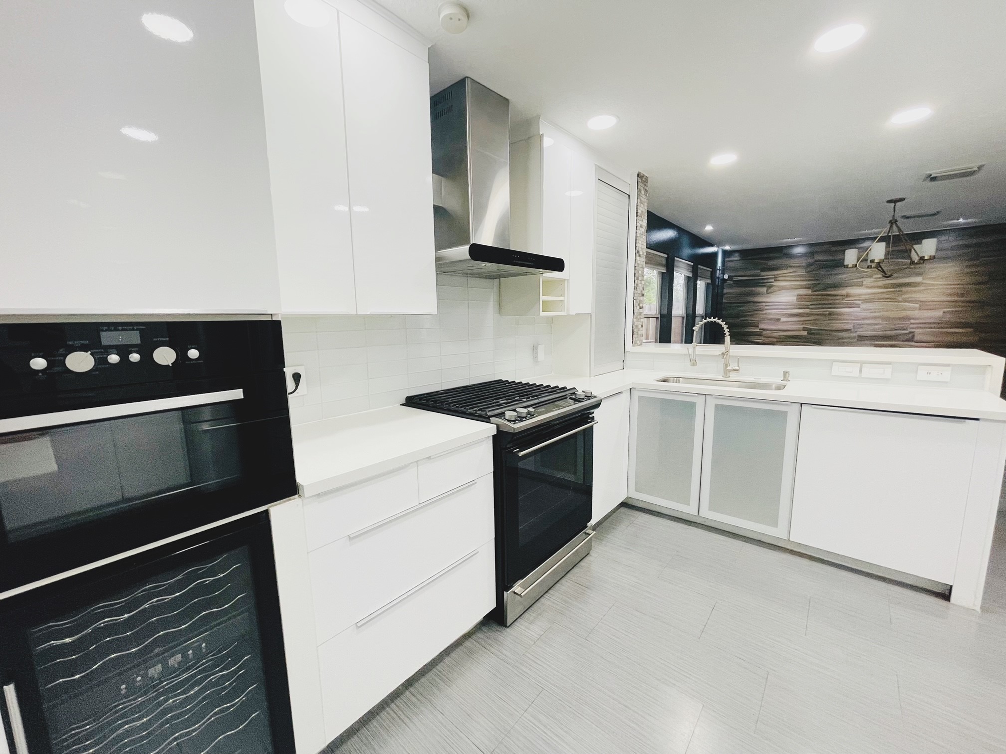 19639 River Bottom Road Katy, TX 77449 - Photo 11 of 36 a kitchen with a stove and a refrigerator
