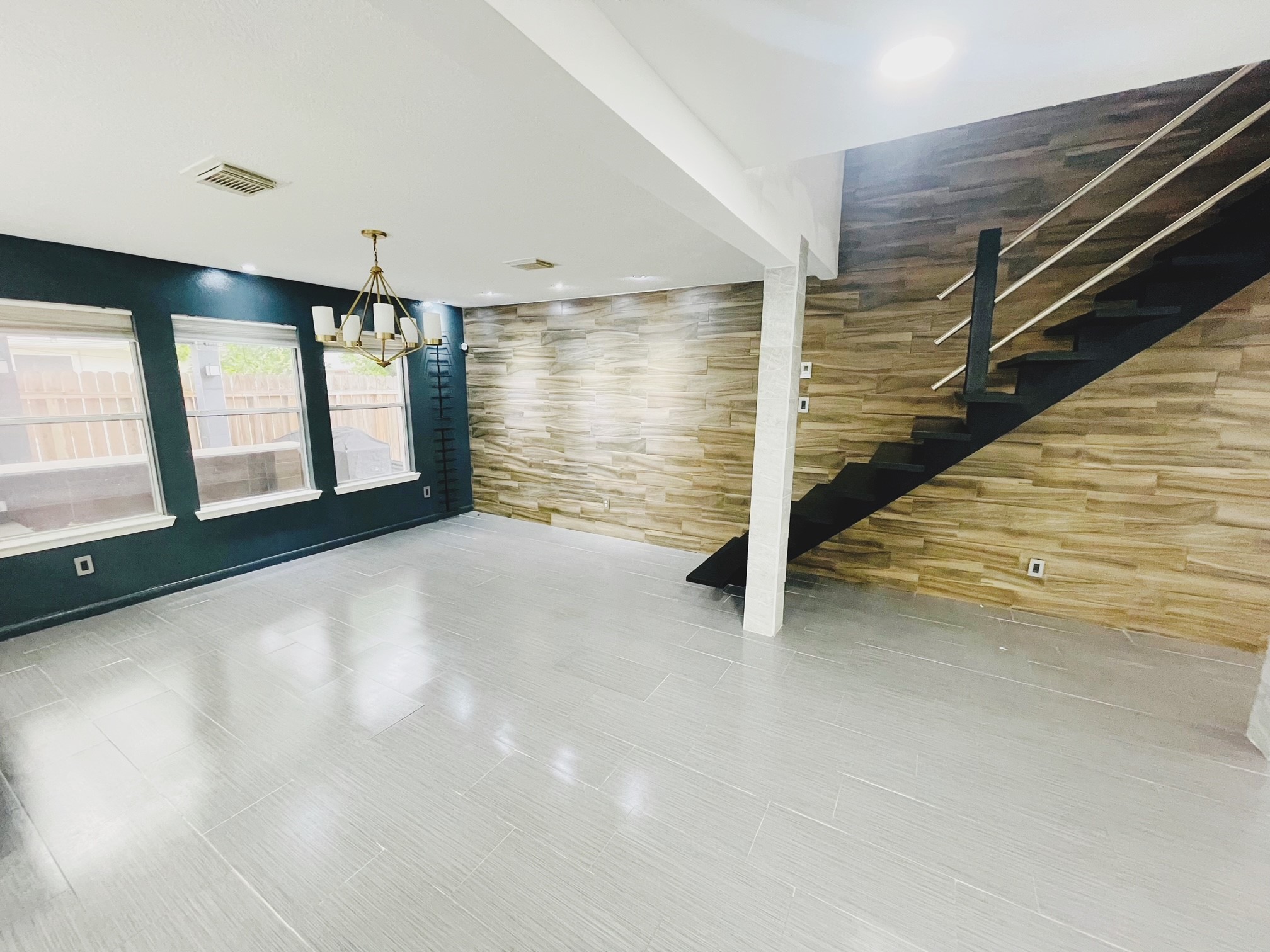 19639 River Bottom Road Katy, TX 77449 - Photo 16 of 36 a view of an empty room with stairs