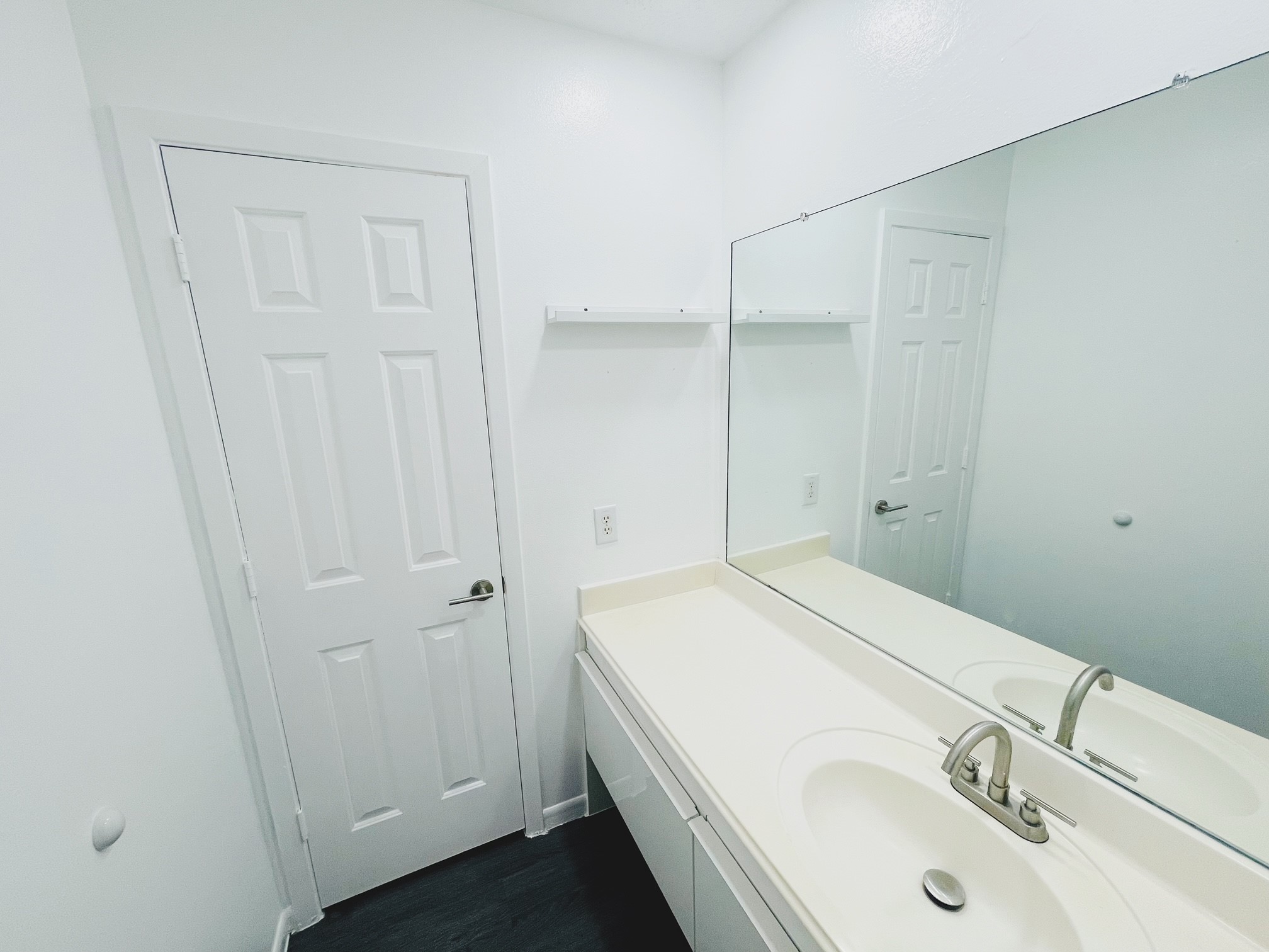 19639 River Bottom Road Katy, TX 77449 - Photo 25 of 36 a bathroom with a sink and a mirror