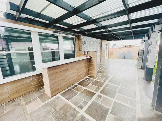 a view of a backyard with a garden